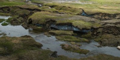 Thawing permafrost accelerates greenhouse gas release
