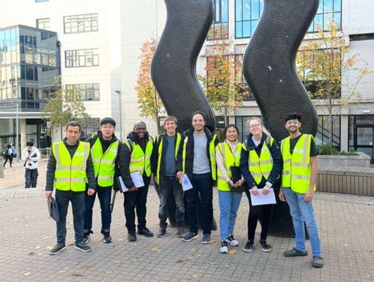 A photo of a group of Railway Operations, Management and Policy MSc 2023 students after carrying out travel surveys on campus.