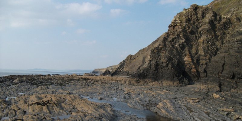 A photograph of a rocky coastline.