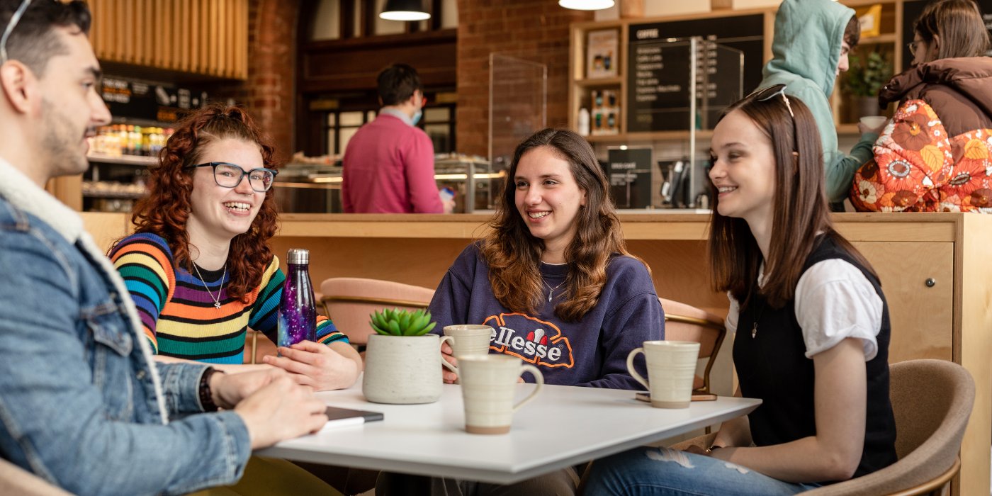 Students chatting in the Bragg cafe