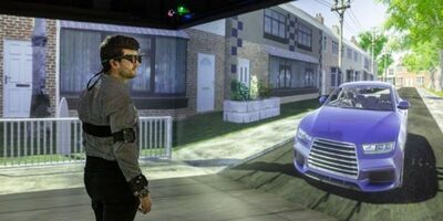 A person standing within a city simulator