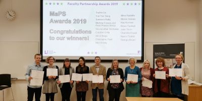 A photograph a a group of staff members who have won an award in the Faculty Partnership Awards 2019.