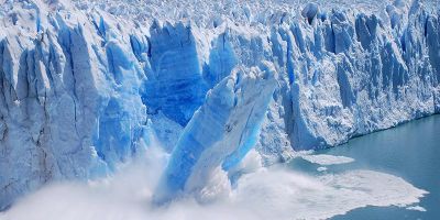 The edge of  glacier beginning to fall into the sea.