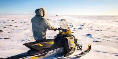 Snowmobile is a common mode of transport in Inuit communities. Temperature influences machine functioning, potential of getting stuck and conditions of ice and snow. Credit: Dylan Clark, McGill University, Canada