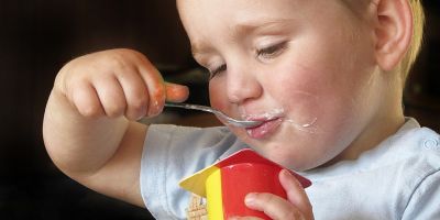 Boy eating yoghurt