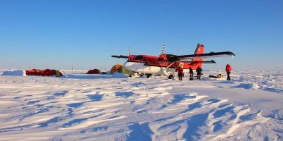 Caption: Setting up camp on sea ice in the Lincoln Sea, north of Greenland, in March 2014 as part of the ESA CryoVex experiment to measure sea ice properties including the depth of drifting snow.