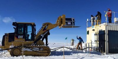 Using heavy equipment to put the lidar on the roof