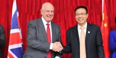 President Xu Fei (right), of Southwest Jiaotong University, and Sir Alan Langlands, Vice-chancellor of The University of Leeds, shake hands at the launch of the The SWJTU-Leeds Joint School in Chengdu, China on 30 October, 2015.