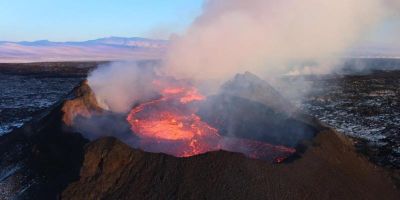 Holuhraun volcano with smoke rising from the top