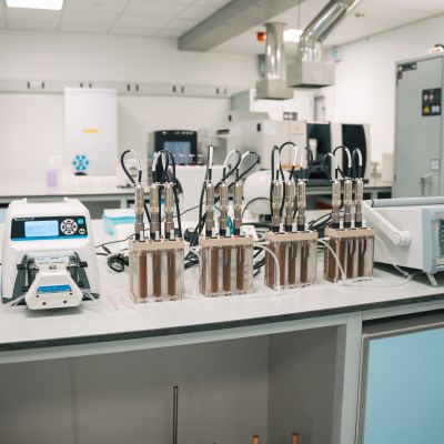 photo of a lab bench with many machines
