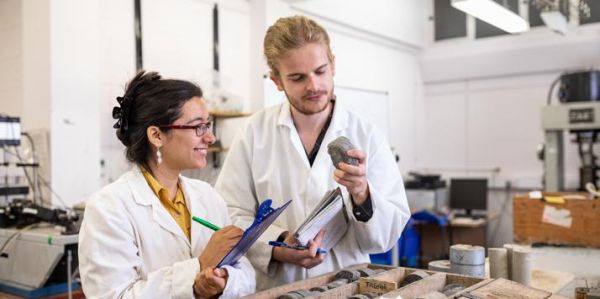 Students working in the rock mechanics lab in the School of Earth and Environment