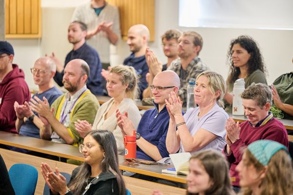 Audience applause for Professor Morris' Faculty Inaugural Lecture.