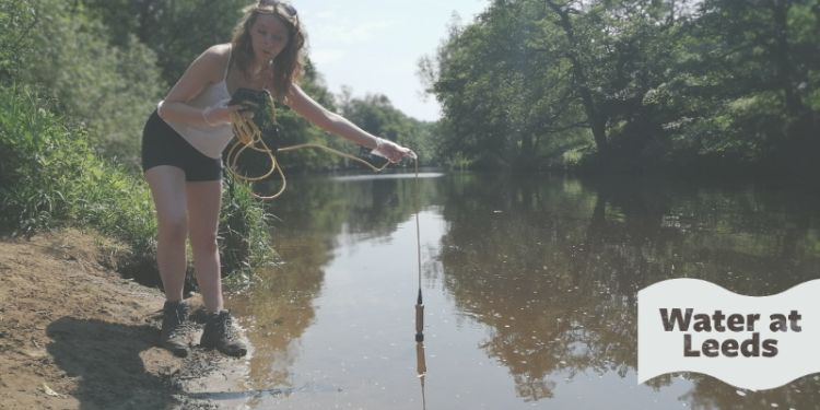 Maddy Wright holding a testing probe in a river. The logo overlay reads 'Water at Leeds'.