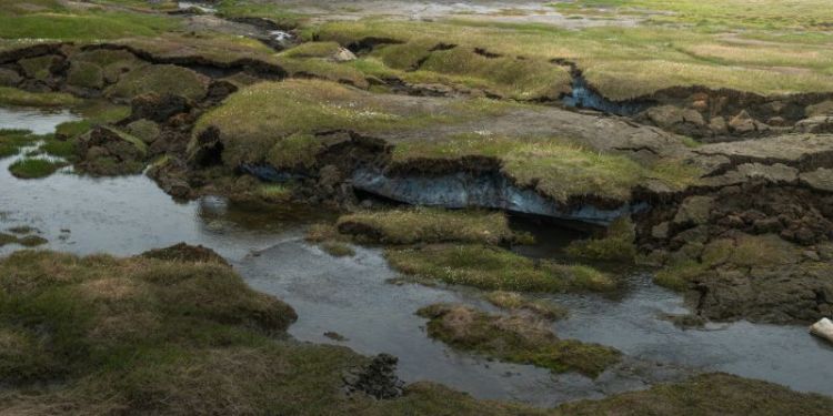 Thawing permafrost accelerates greenhouse gas release