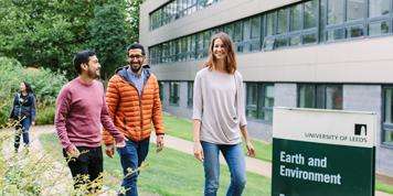 Image of Masters students walking outside the School of Earth and Environment