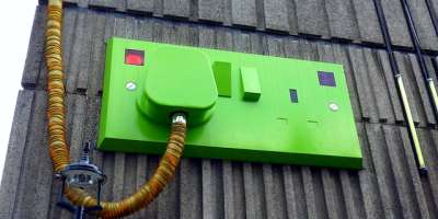 A bright green plug switch.