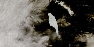 An image of A68A iceberg approaching the island of South Georgia (14 December 2020). The left hand part of the image are clouds.